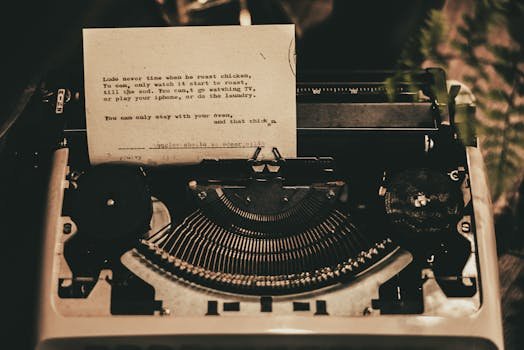 An antique typewriter displaying a typed poem in a nostalgic sepia tone.